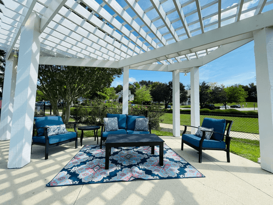 Gazebo with chairs at The Chase Apartment Homes located in Burlington, NC.