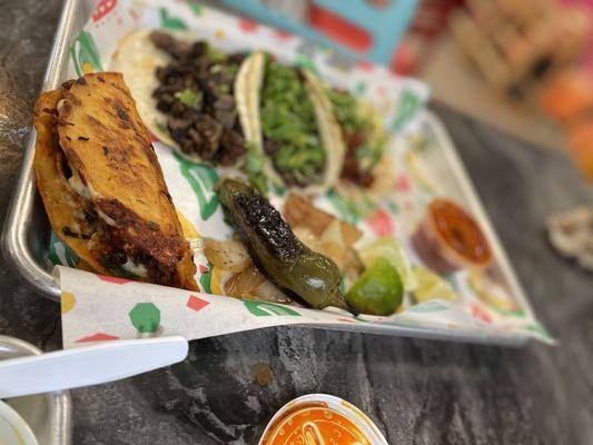 Birria, asada, and pastor tacos