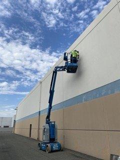 Changing old outside warehouse lights to new LED lights