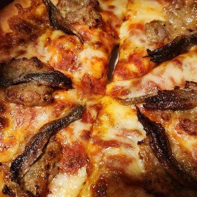 Sausage anchovies pizza