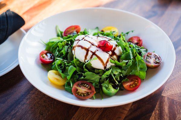 Burrata Salad 
Burrata Cheese Rainbow cherry tomato , Arugula, Balsamic Glaze