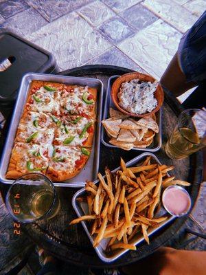 Pizza, artichoke dip, fries + special sauce