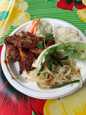 Ike's spicy chicken wings lunch special. Papaya salad and sticky rice.