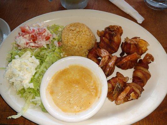 Bacon wrapped shrimp with a jalapeno inside.