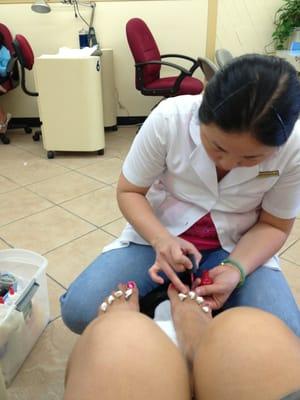 Jennifer doing my pedicure on June 10.