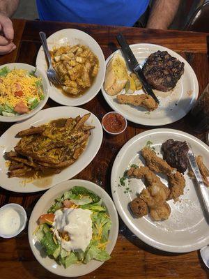 fried Catfish and Shrimp Plate ($24); 12-14oz Ribeye ($29) Both w/ 1 side (Red Skin Fries & Plan fries with gravy & cheese) & House salads