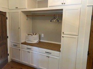 built in cabinets and folding counter for laundry room