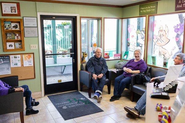 Happy clients in our waiting room at Petaluma Veterinary Hospital.