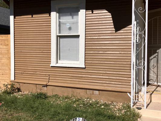 Replace 2x4 trim board, repair siding and spot paint