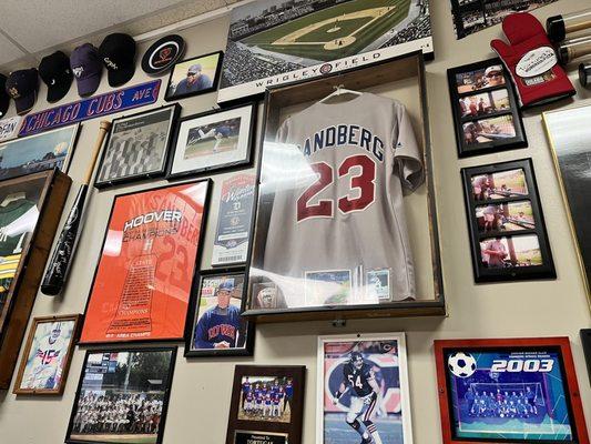 Jerseys and sports stuff on walls