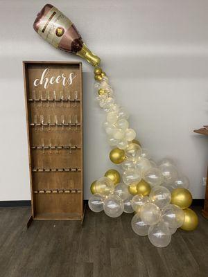 Balloon Garland with champagne glass wall. (Package comes with the glasses).