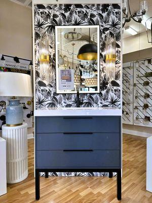 Bath vanity cabinet/sink with lighted LED mirror display.