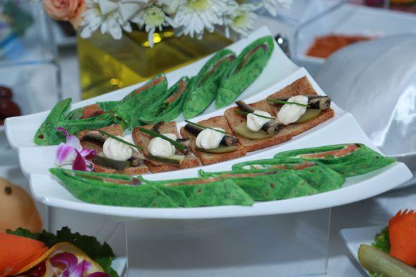 Smoked sprats with salmon rolls