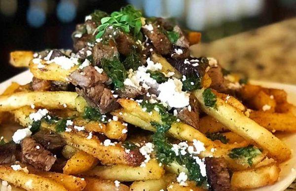 Chimichurri steak fries appetizer. Big enough for a meal or shared appi.