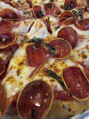 The honey glazed pizza is perfectly cooked. Just look at the crispy pepperonis!