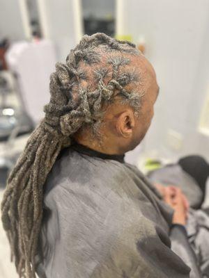 Back view of braided locs.