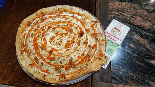 Our Buffalo Chicken Pizza with choice of ranch or blue cheese