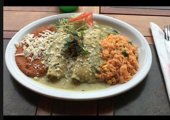 Special Enchiladas Suizas! (creamy tomatillo- cilantro sauce over two rolled chicken enchiladas)