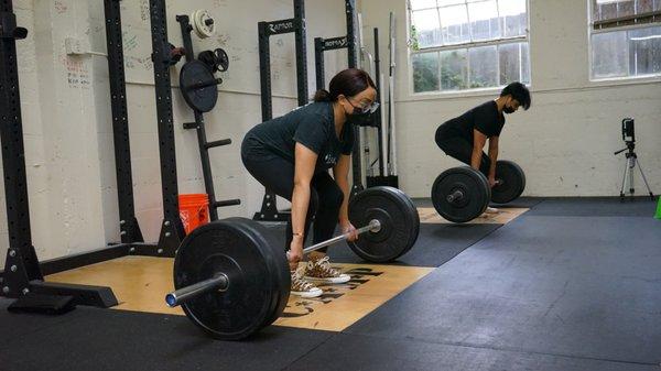 Members attempting the deadlift