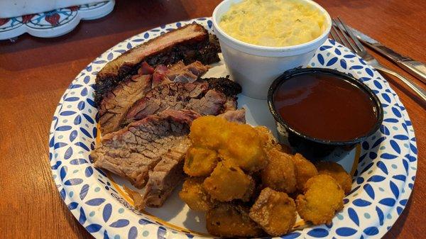 Moist brisket, rib, fried okra, potato salad, bbq sauce. This was only part of my to-go order.