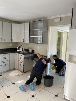 Cleaning the kitchen floor