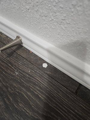 Paint drips on hardwood floor