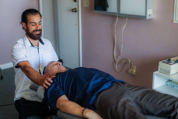 Stretching the neck to get a subtle release in spinal chord tension