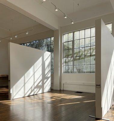 Our Studio space has gorgeous natural light, tall ceilings and large windows.