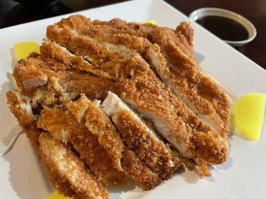 Chicken Katsu dinner entree with Katsu sauce, lettuce and white rice (not in picture)