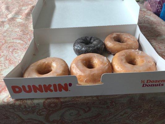 Half dozen donuts...and then there were 5 (chocolate glazed, sour cream, and glaze donut).