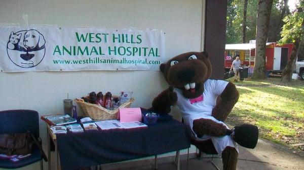 Benny the Beaver visits our hospital's booth at a local charity event.