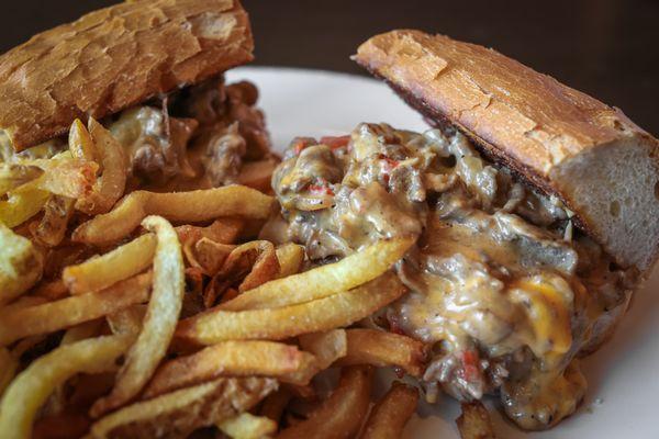 100% Ribeye Carved In-house w/ Scratch Cheese Sauce Philly Cheesesteak