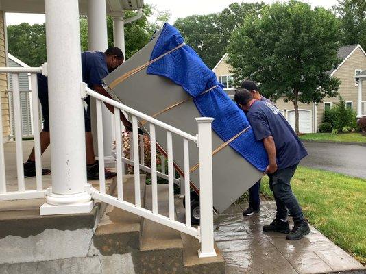 Absolute Packing team doing what they do, moving my refrigerator.