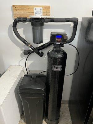 Customer supplied water softener and filtration system install. (loop present) Give Everest Plumbing a call/text (512) 753-9457