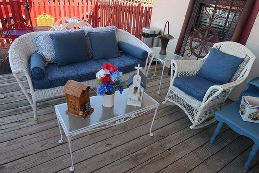 A turn-of-the-century wicker sofa, and other unique finds on our very front-porch!