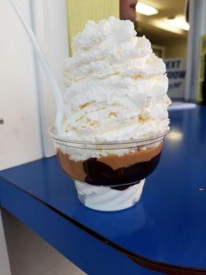 Fresh whip with vanilla ice cream and peanut butter sauce and hot fudge sauce