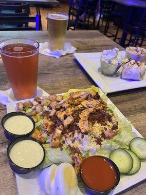 Buffalo chicken salad and fried chicken wrap/baked potato salad.  And beer.....