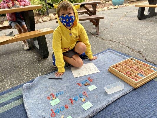 Language work with the Moveable Alphabet Montessori material.