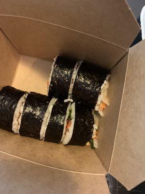 The sushi roll! Comes with a delicious spicy vegan sauce on the side