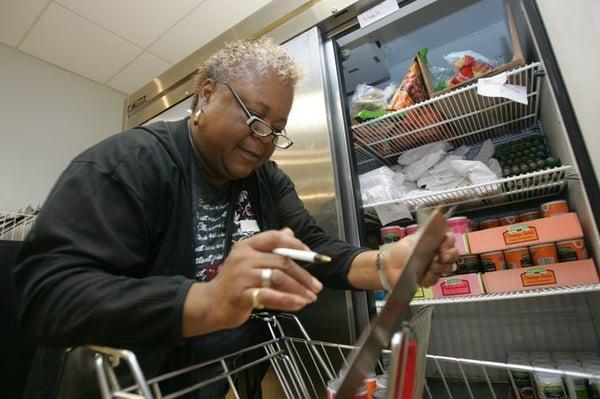 Projects that help the hungry include serving meals and packing food at food pantries. 