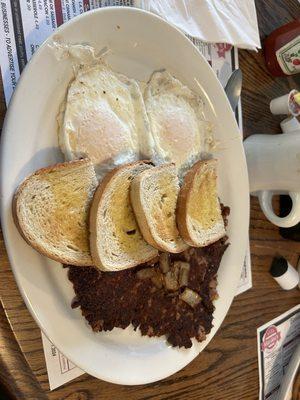 Hash eggs and rye toast