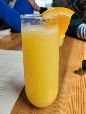 $4 mimosa.  sweet ripe orange wedge