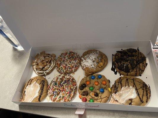 Flufftella S'mores, Cinnamon Roll, Birthday Cake, Rainbow M&M Chip, Cookies N' Cream, and Funnel Cake