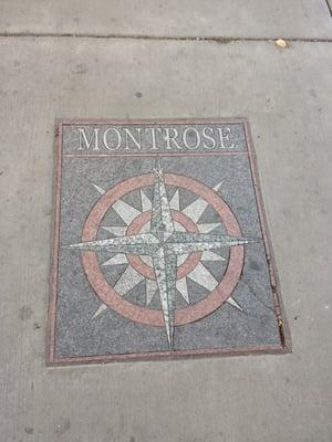 The compass on the ground.