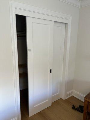 Customer wanted sliding doors reused and converted into French doors for their closet.