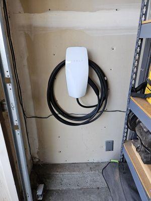 Tesla wall charger installed in our garage.