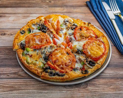 Veggie Pizza (#26): Mushrooms, green peppers, olives, onions  and sliced tomatoes.