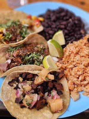 3 taco plate (carnitas, veggies, al pastor) with rice and beans