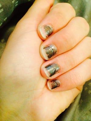 Here is another picture of my nails. Excuse the chipping. I'm trying to show how bad she drilled down into my nail.