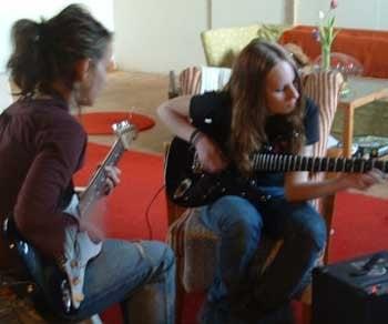 Nikki O'Neill (left) teaching a student at one of her clinics in Sweden.